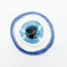 A single circular evil eye bath bomv with a blue and white design, shown on a plain white background.