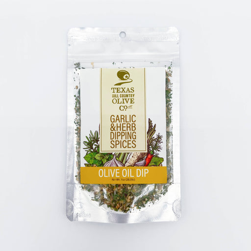 Packaged garlic and herb dipping spices with Texas Hill Country Olive Co branding on a white background