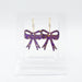 Sandy and Rizzo Purple and Gold Glitter Game Day Dangle Bow Hoop Earrings 
