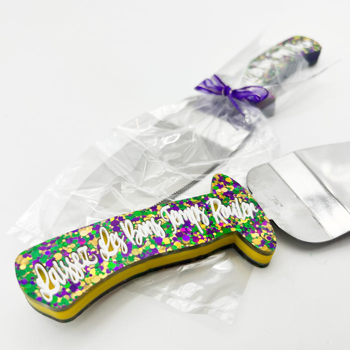 Laissez Les Bons Temps Rouler Let The Good Times Roll King Cake knife stays in the box stainless steel purple green and gold knife