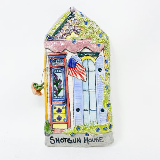 Hand-painted Ceramic shotgun house featuring an American Flag and hanging plant Made In New Orleans Louisiana
