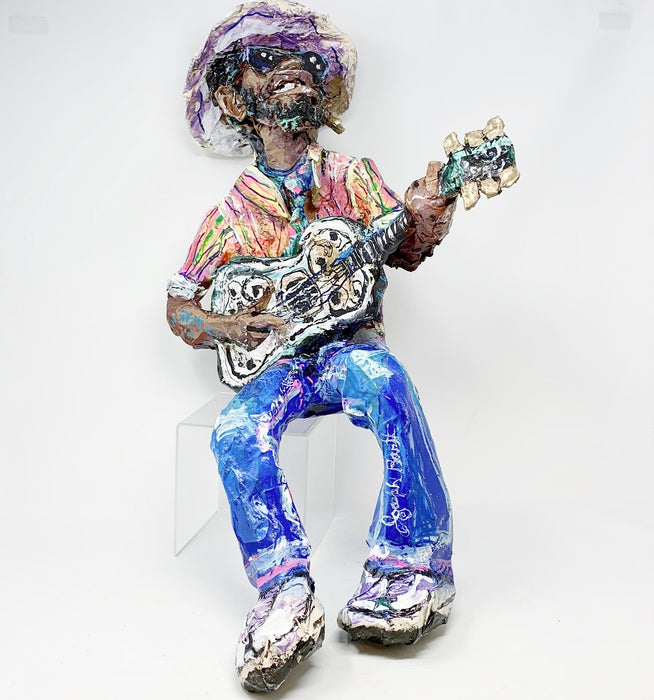 JB: Paper Mâché Guitar Player