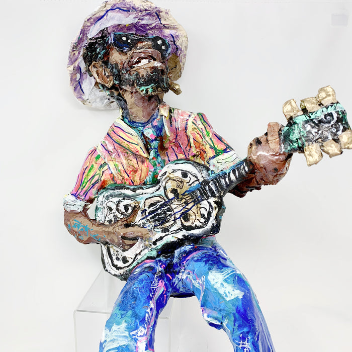 JB: Paper Mâché Guitar Player