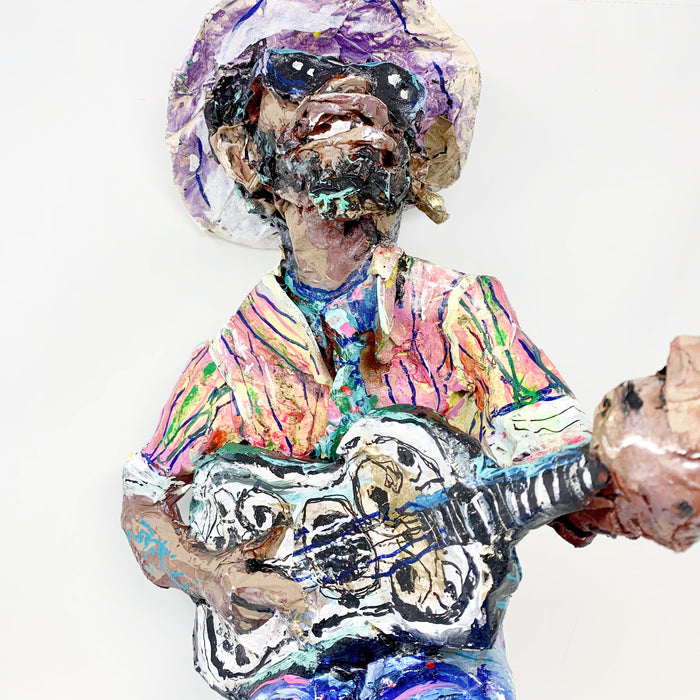 JB: Paper Mâché Guitar Player