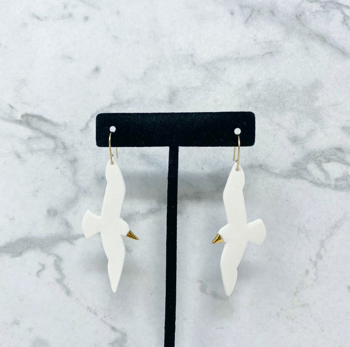 White Porcelain bird earrings with gold dipped beak Home Malone New Orleans